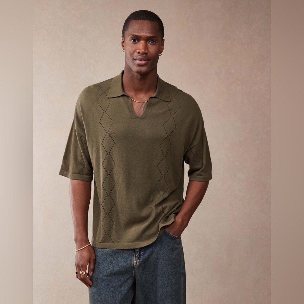 ASOS DESIGN relaxed knit notch neck polo shirt with pointelle pattern